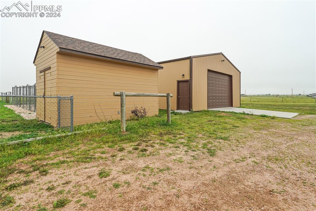 21445 Scott Road Calhan, CO 80808 - Photo 49 of 50 a backyard of a house with lots of green space