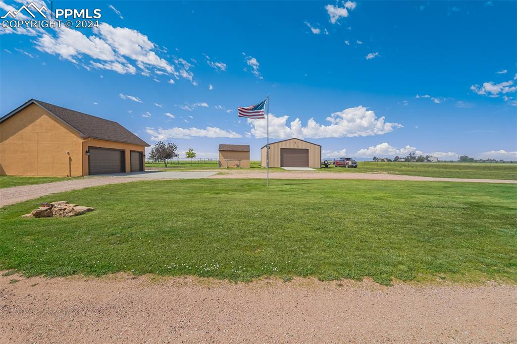 21445 Scott Road Calhan, CO 80808 - Photo 6 of 50 a view of a house with a big yard
