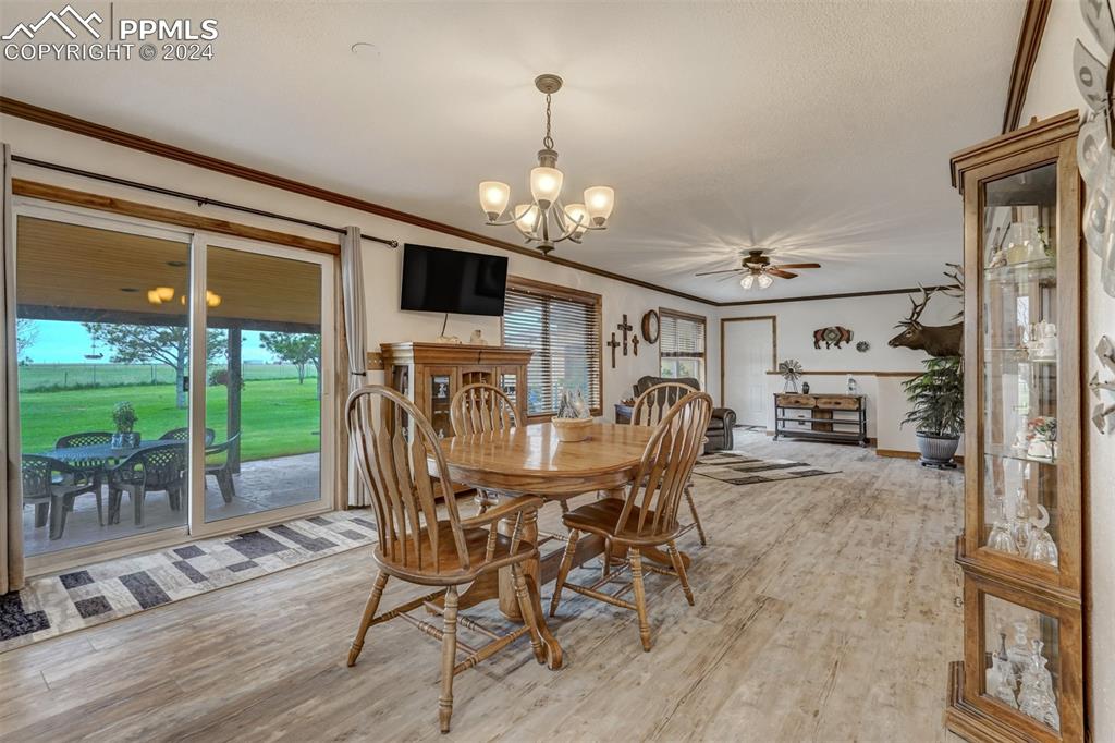 21445 Scott Road Calhan, CO 80808 - Photo 10 of 50 a view of a dining room with furniture window and outside view