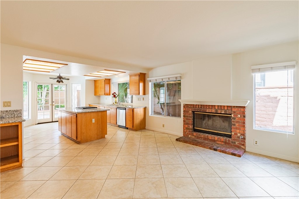 2132 Burnt Mill Road Tustin, CA 92782 - Photo 6 of 21 a view of open kitchen with granite countertop cabinets and outdoor space