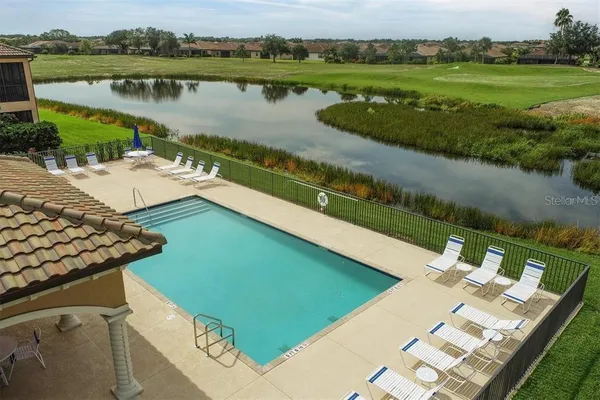 a view of a lake with a yard