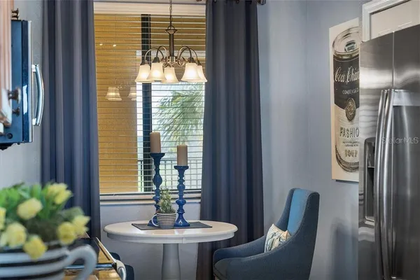 a view of a livingroom with furniture and window