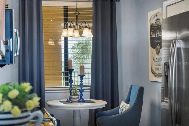 a view of a livingroom with furniture and window