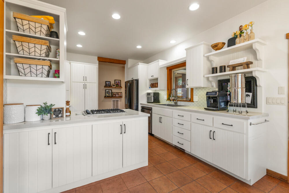 11750 Merganser Road Klamath Falls, OR 97601 - Photo 17 of 66 a kitchen with stainless steel appliances granite countertop a sink and cabinets