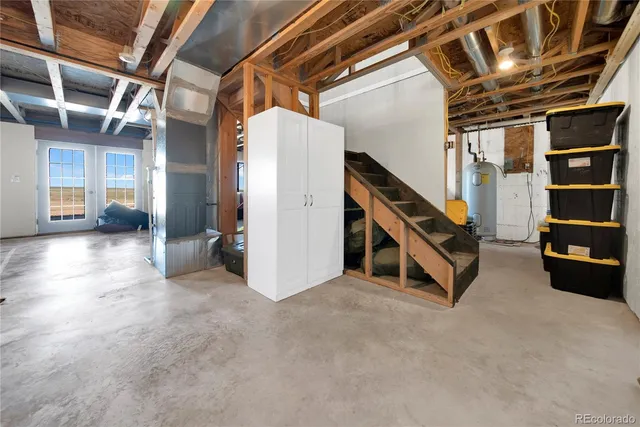 a view of an empty room with stairs