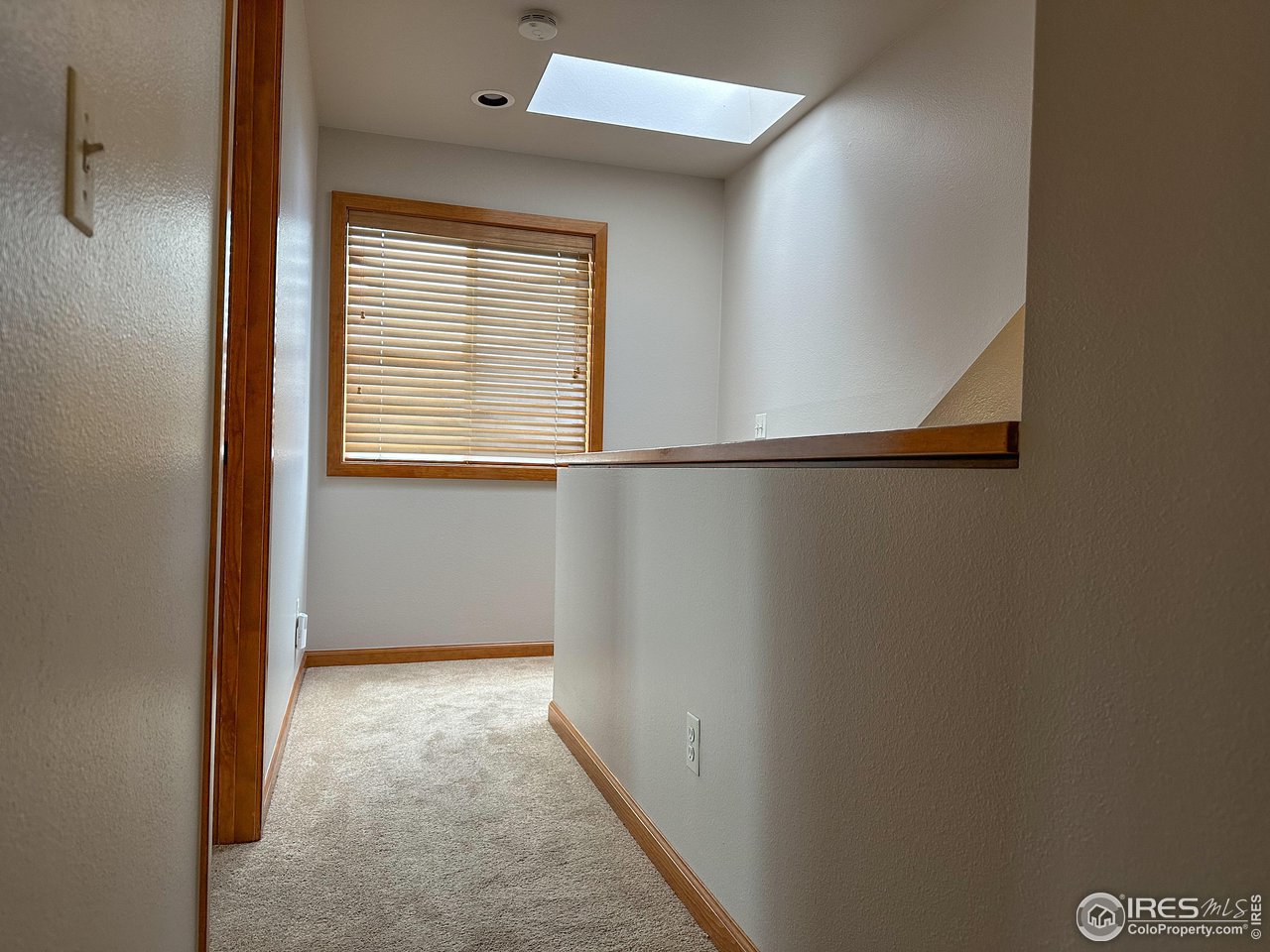 4491 Wellington Road Boulder, CO 80301 - Photo 10 of 40 a view of an empty room with a window