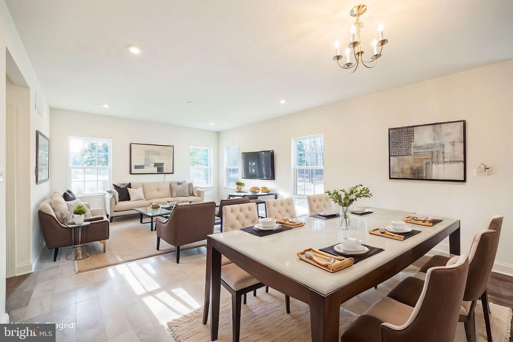 133 A Woosamonsa Road Pennington, NJ 08534 - Photo 7 of 25 a view of a dining room with furniture and a livingroom