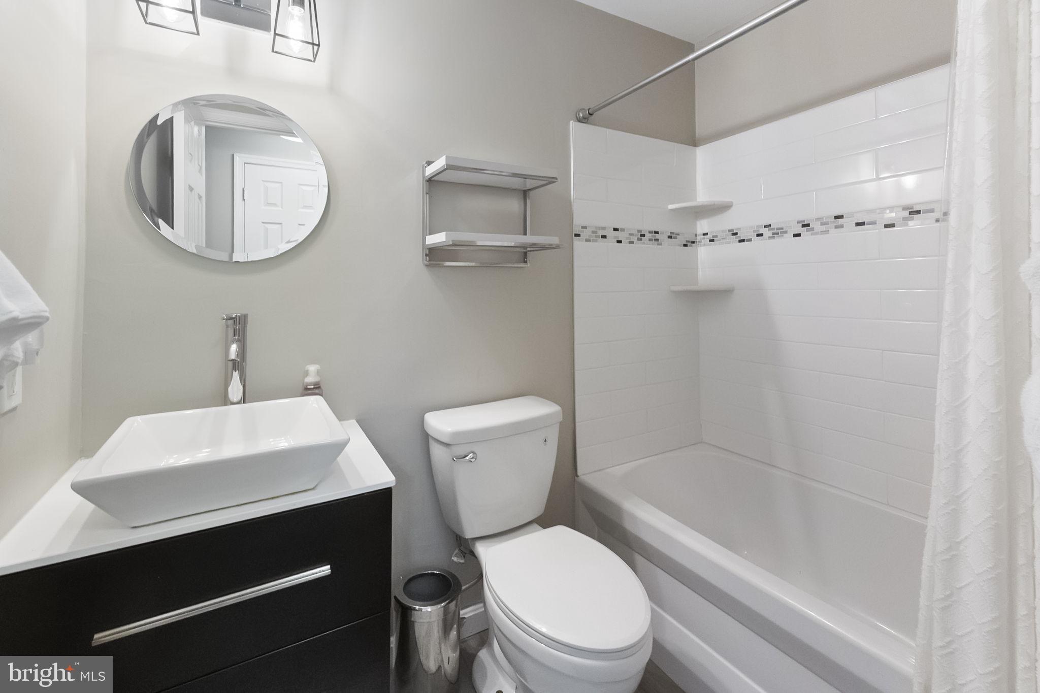 3207 Breckenridge Way Riva, MD 21140 - Photo 36 of 51 a bathroom with a toilet a sink and a mirror