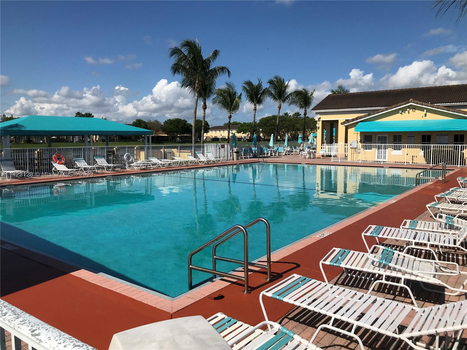 1652 Southeast 28th Street, Unit 105 Homestead, FL 33035 - Photo 16 of 18 a view of swimming pool from a balcony