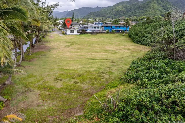 a view of a lake with a building in the background