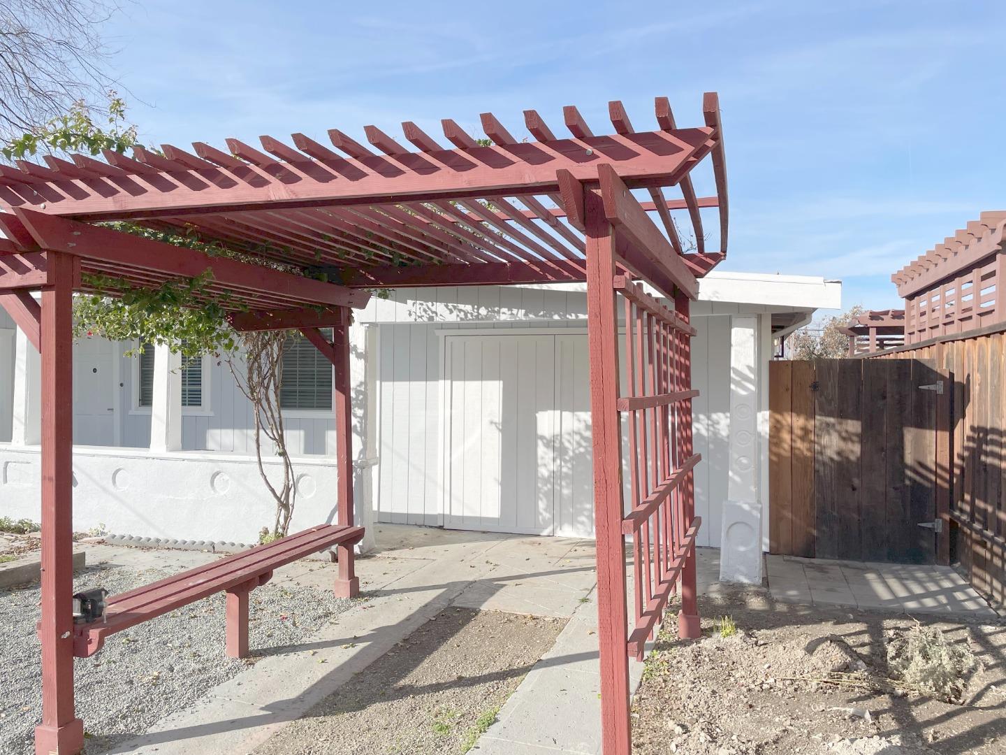 1758 5th Street, Unit STUDIO Livermore, CA 94550 - Photo 2 of 6 a view of a porch with furniture and a yard