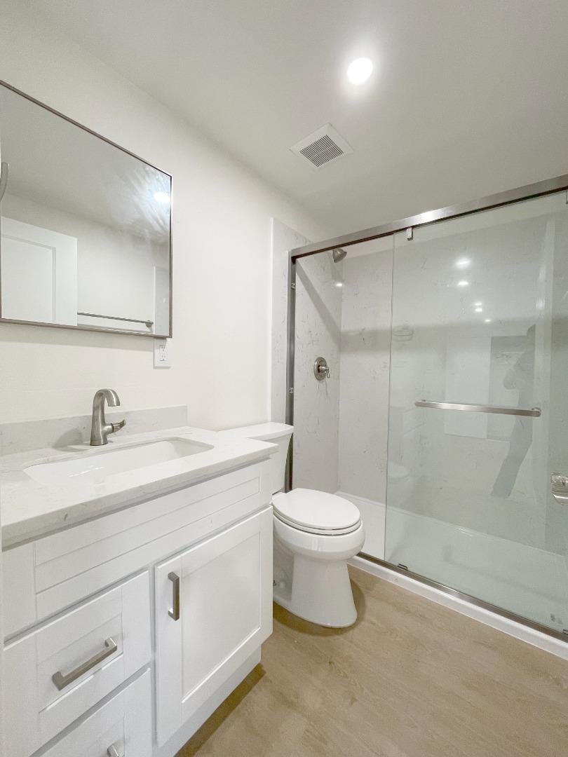 1758 5th Street, Unit STUDIO Livermore, CA 94550 - Photo 6 of 6 a bathroom with a toilet sink and shower