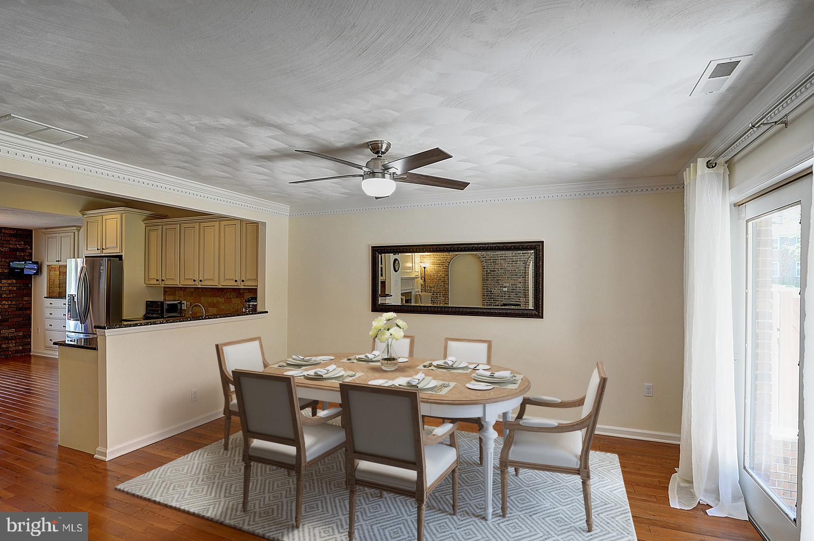 1 Cavalier Drive Hamilton, NJ 08619 - Photo 12 of 44 a view of a dining room with furniture