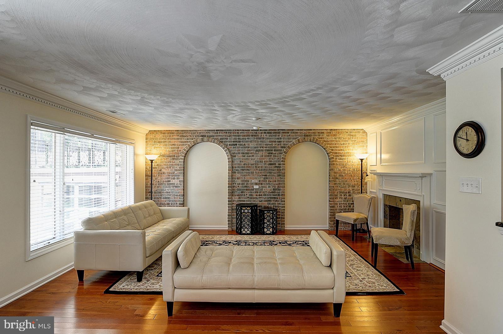 1 Cavalier Drive Hamilton, NJ 08619 - Photo 15 of 44 a living room with furniture and a fireplace