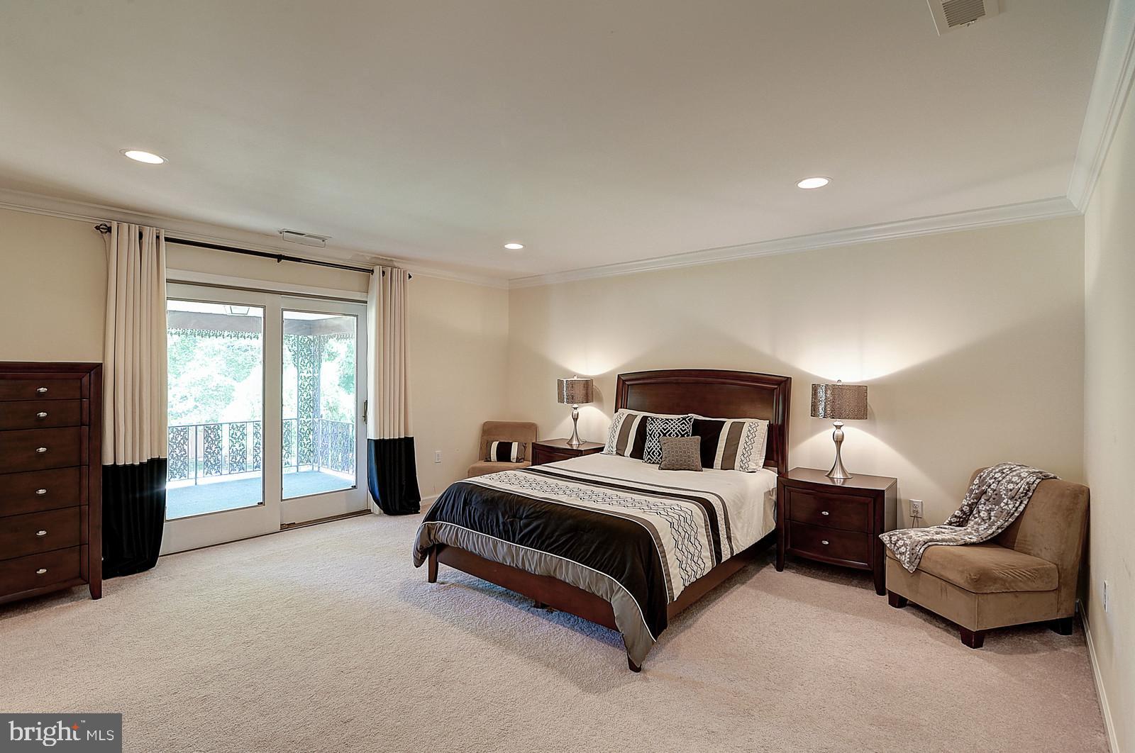 1 Cavalier Drive Hamilton, NJ 08619 - Photo 17 of 44 a spacious bedroom with a bed and a couch