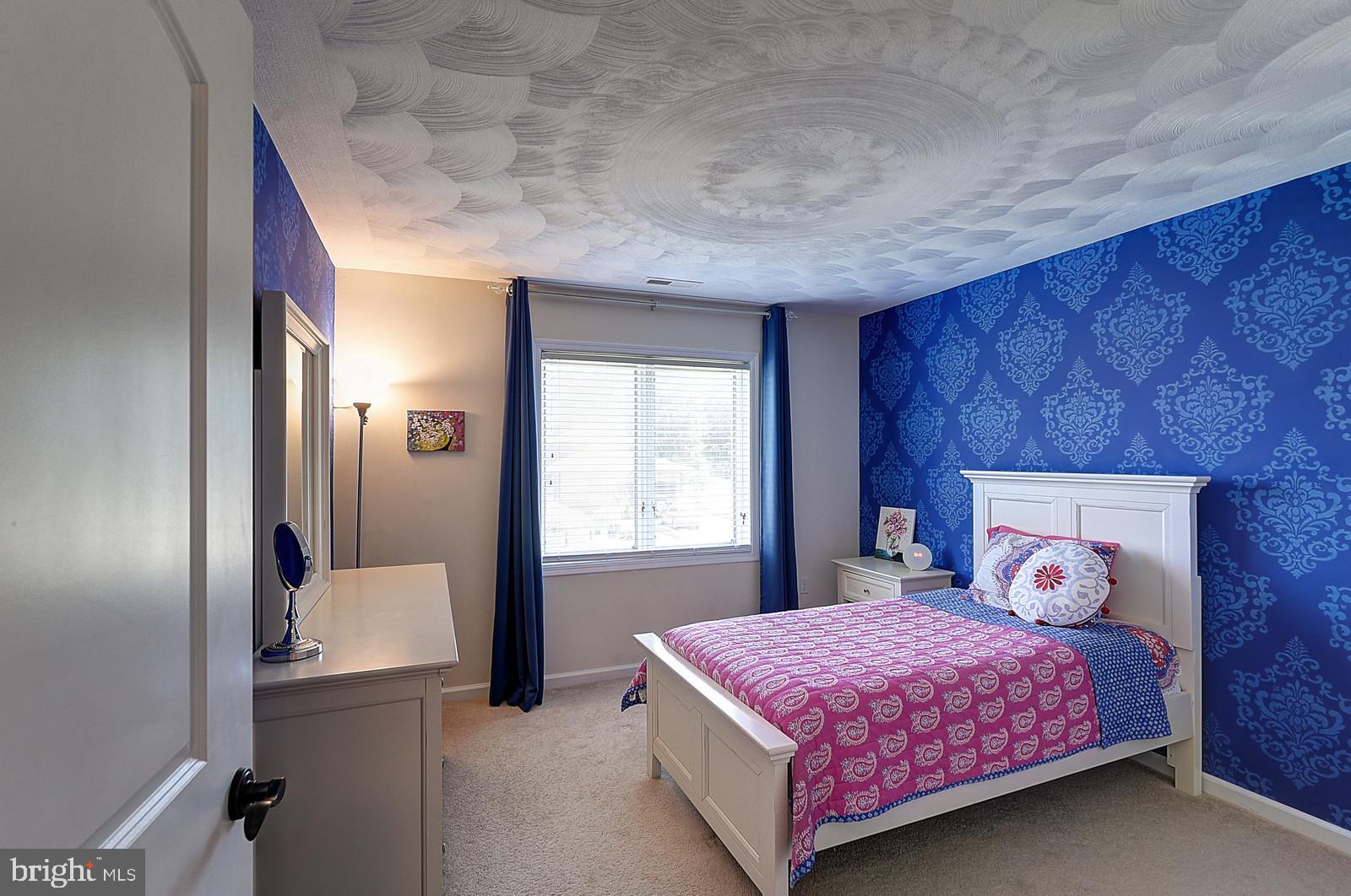 1 Cavalier Drive Hamilton, NJ 08619 - Photo 25 of 44 a bedroom with a bed and window