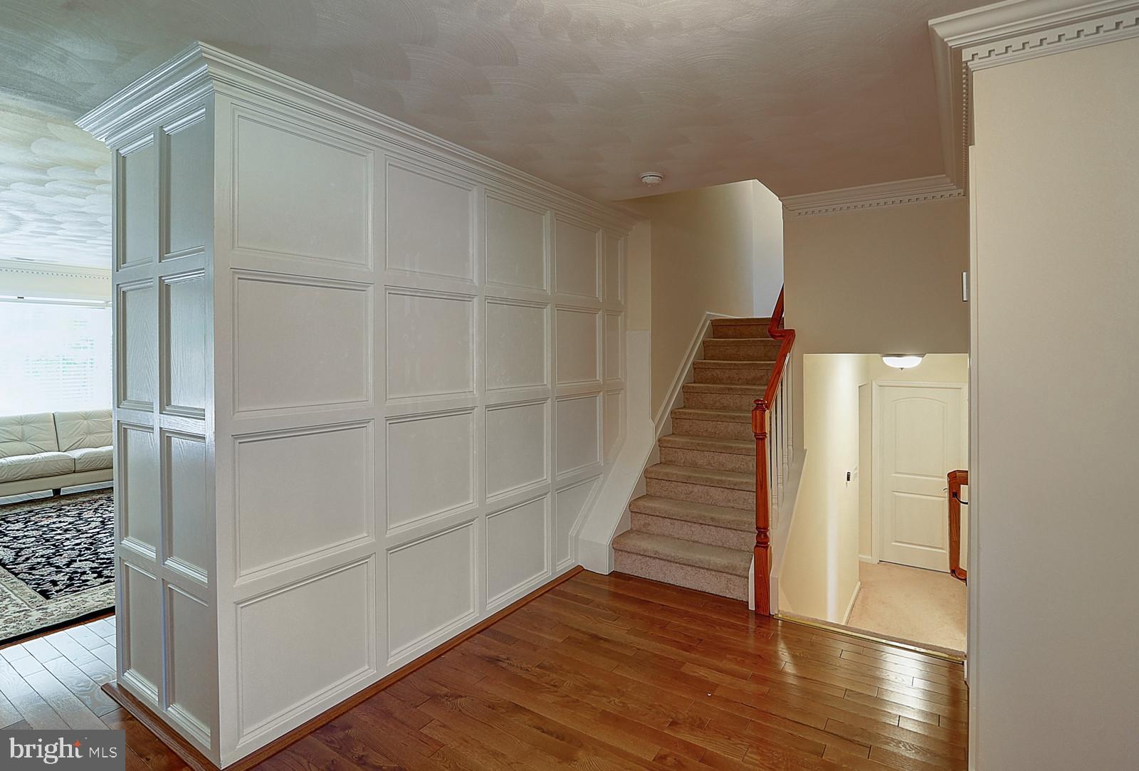 1 Cavalier Drive Hamilton, NJ 08619 - Photo 4 of 44 a view of a hallway with wooden floor and entryway