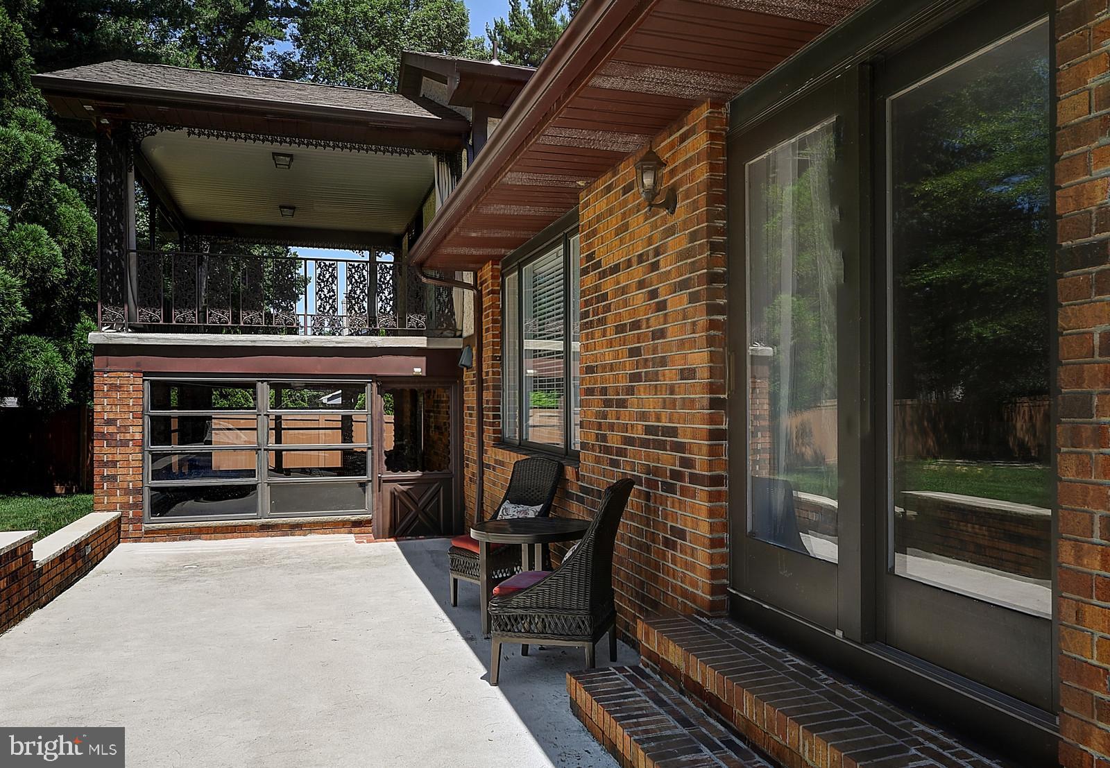 1 Cavalier Drive Hamilton, NJ 08619 - Photo 37 of 44 a view of a porch with furniture and a yard