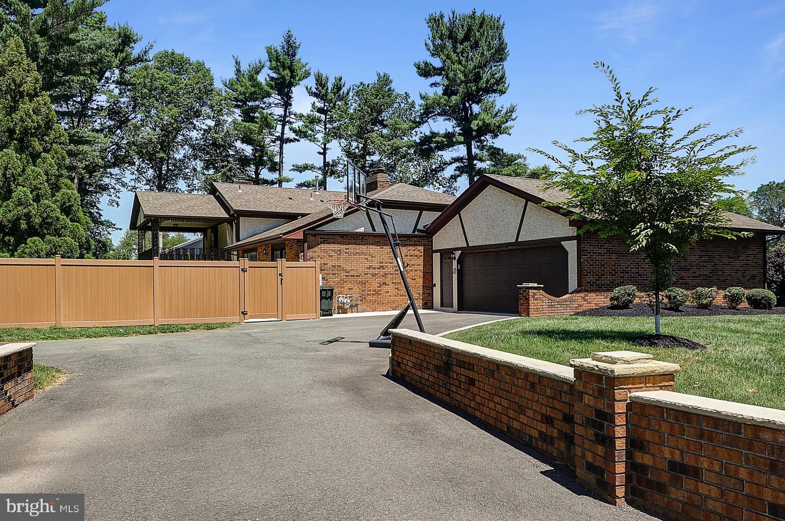 1 Cavalier Drive Hamilton, NJ 08619 - Photo 40 of 44 a front view of a house with garden