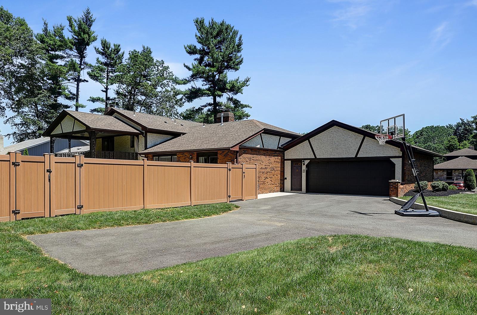 1 Cavalier Drive Hamilton, NJ 08619 - Photo 41 of 44 a house with garden in front of it
