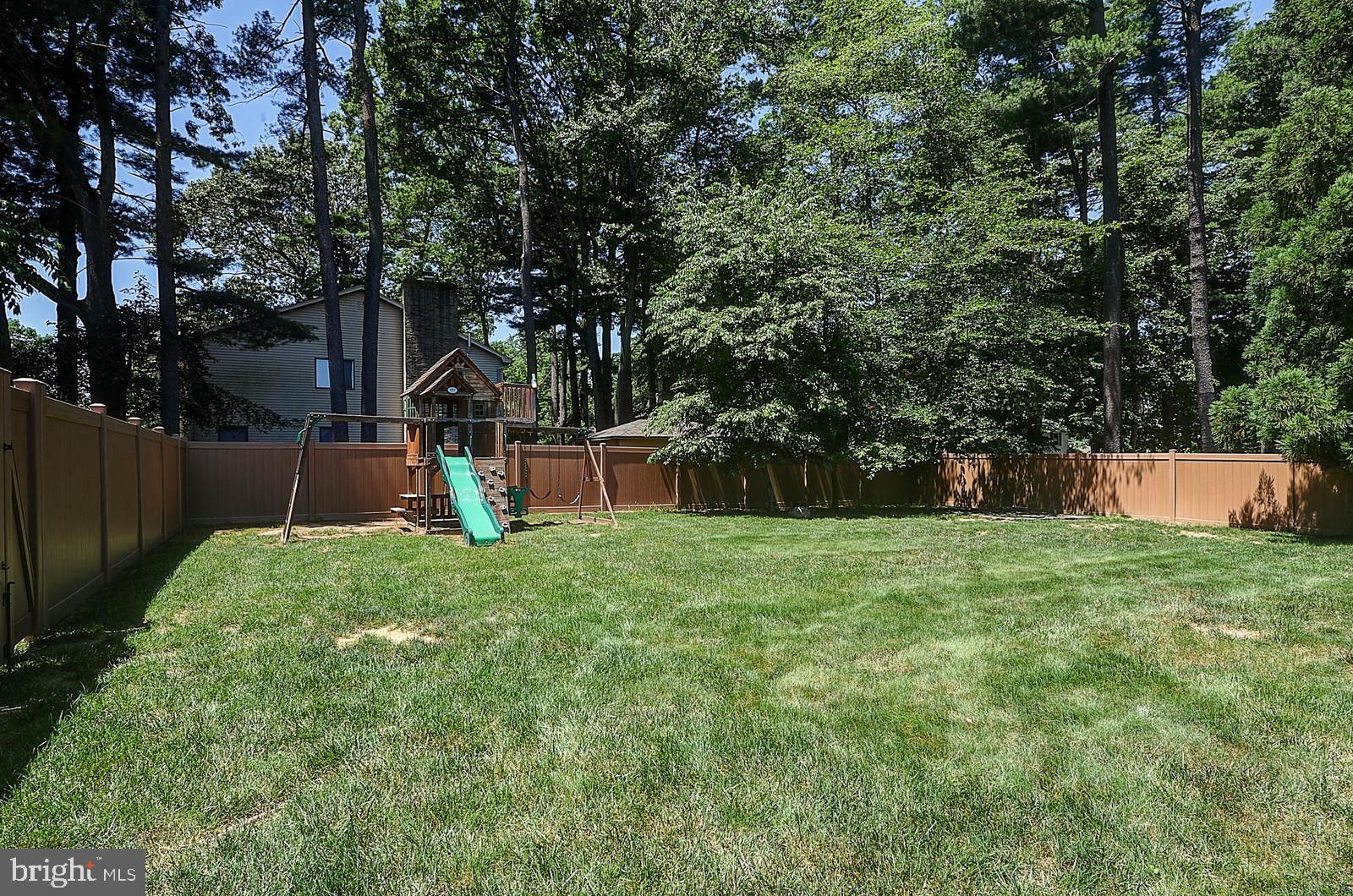 1 Cavalier Drive Hamilton, NJ 08619 - Photo 42 of 44 a view of a backyard with a garden