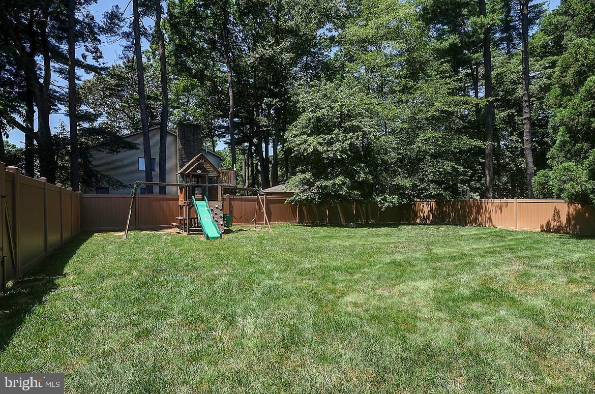 1 Cavalier Drive Hamilton, NJ 08619 - Photo 43 of 44 a front view of a house with a yard