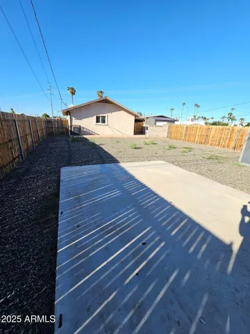 a view of a parking space in a yard