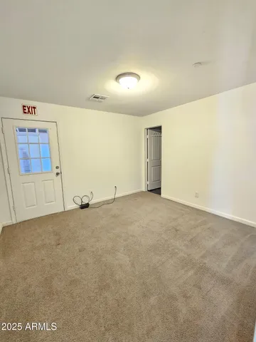 a view of house with yard