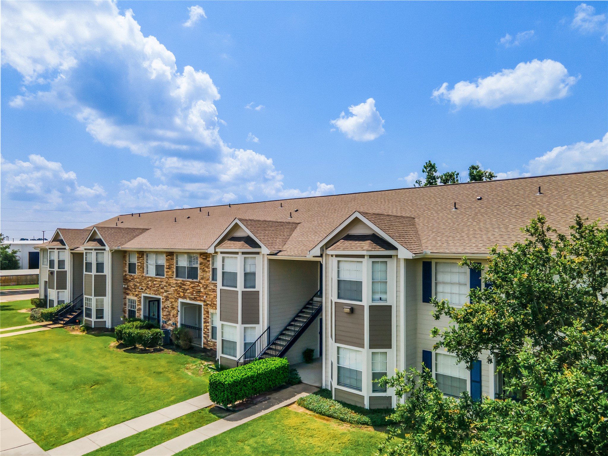3419 Fountains Drive, Unit 1014 Rosenberg, TX 77471 - Photo 10 of 11 a view of a house with a yard
