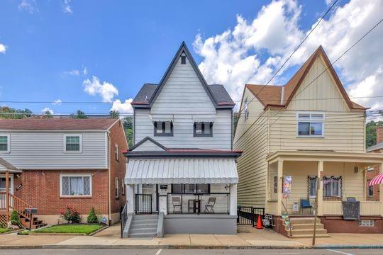 1850 Middle Street Pittsburgh, PA 15215 - Photo 2 of 27 a view of a house with a yard