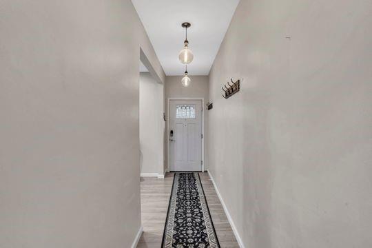 1850 Middle Street Pittsburgh, PA 15215 - Photo 23 of 27 a view of hallway with wooden floor