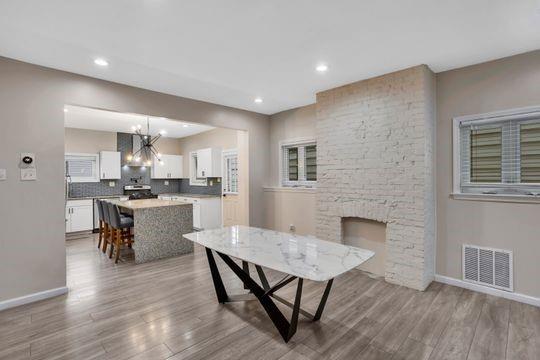 1850 Middle Street Pittsburgh, PA 15215 - Photo 5 of 27 a kitchen with a table and chairs in it