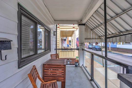 1850 Middle Street Pittsburgh, PA 15215 - Photo 8 of 27 a view of an entryway with wooden floor and windows