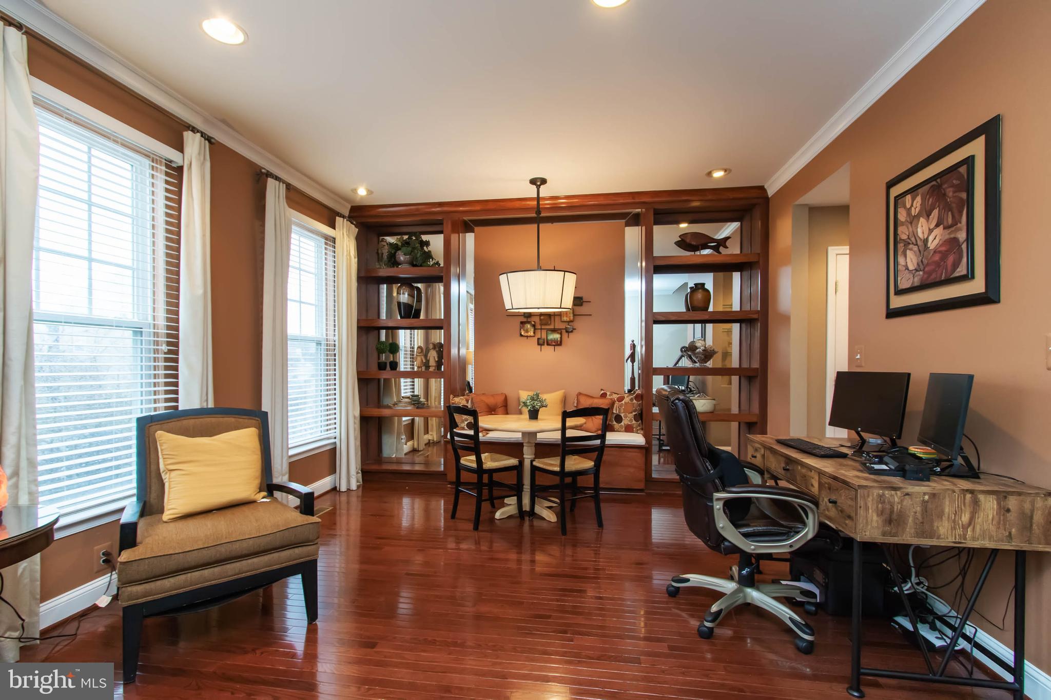 9185 Ribbon Falls Loop Bristow, VA 20136 - Photo 11 of 34 Dining Room w/Custom Built-In Bench and Shelving