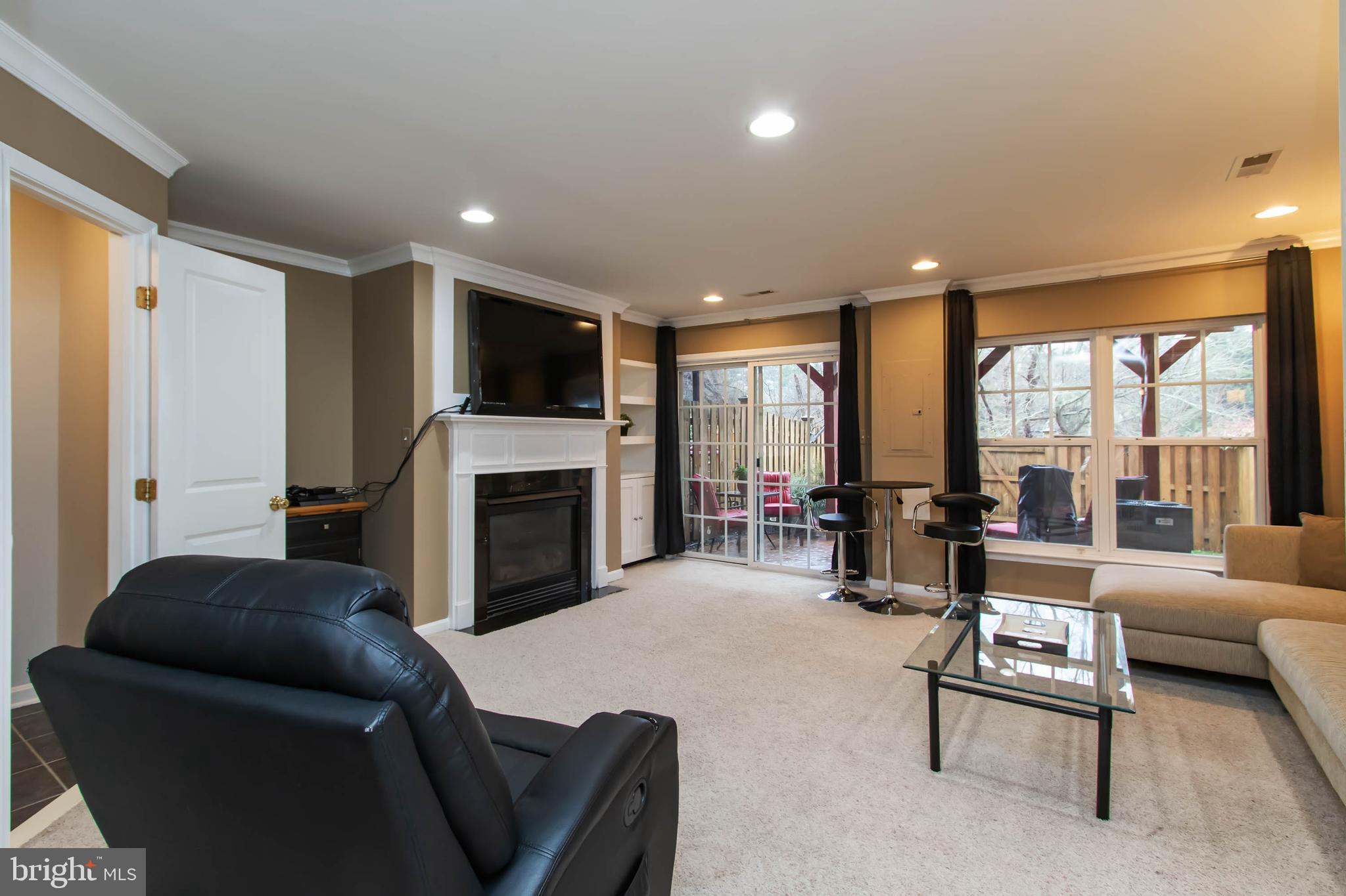 9185 Ribbon Falls Loop Bristow, VA 20136 - Photo 27 of 34 Finished Rec/Game Rm w/Walk-Out and Gas FP