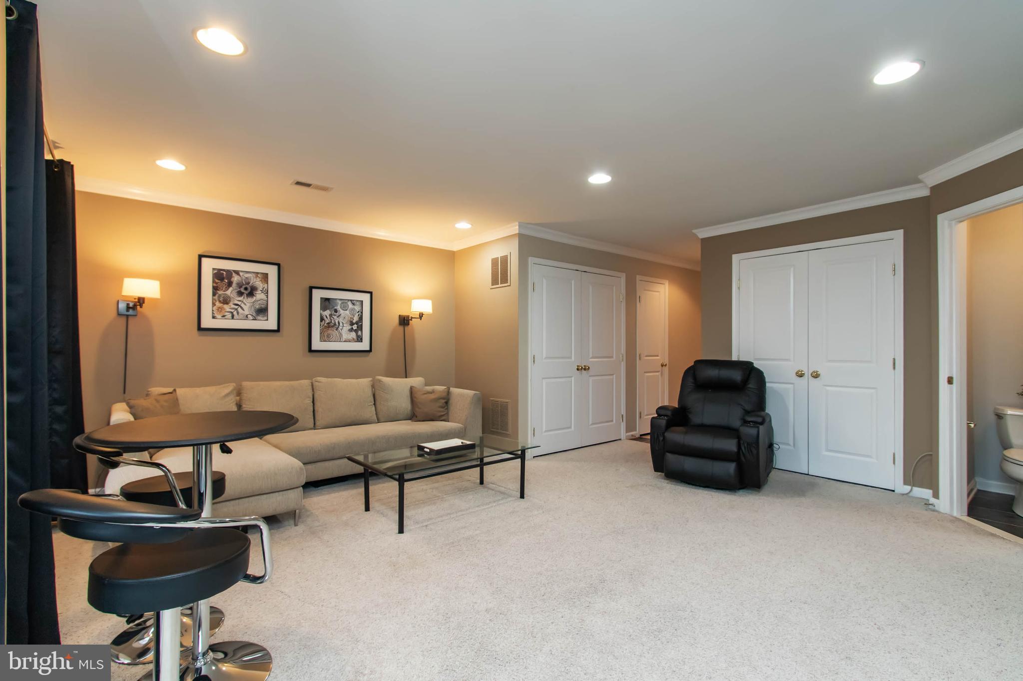 9185 Ribbon Falls Loop Bristow, VA 20136 - Photo 28 of 34 Finished Rec/Grame Rm with Half Bath