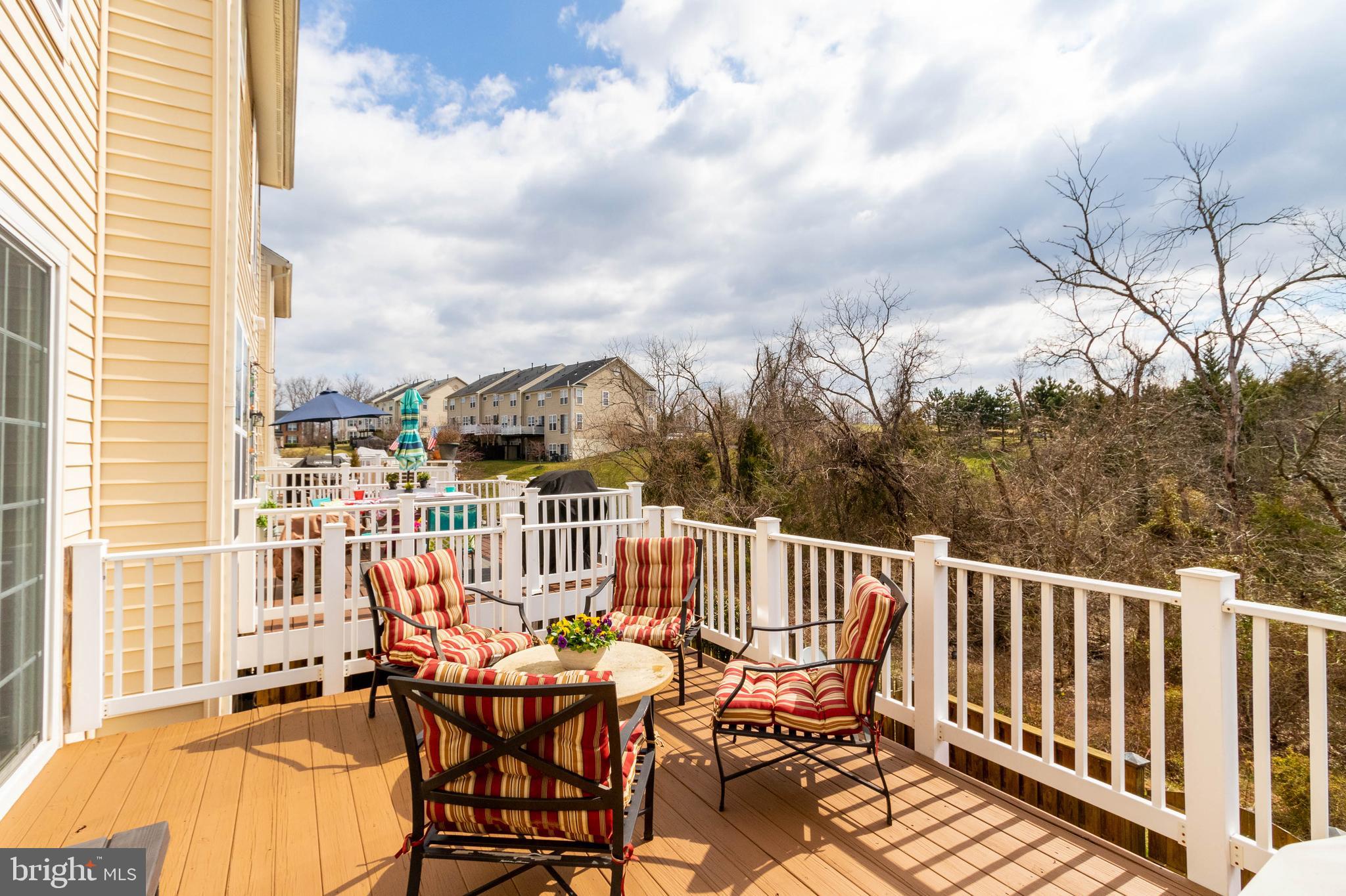 9185 Ribbon Falls Loop Bristow, VA 20136 - Photo 31 of 34 Spacious Open-Air Freshly Painted Deck
