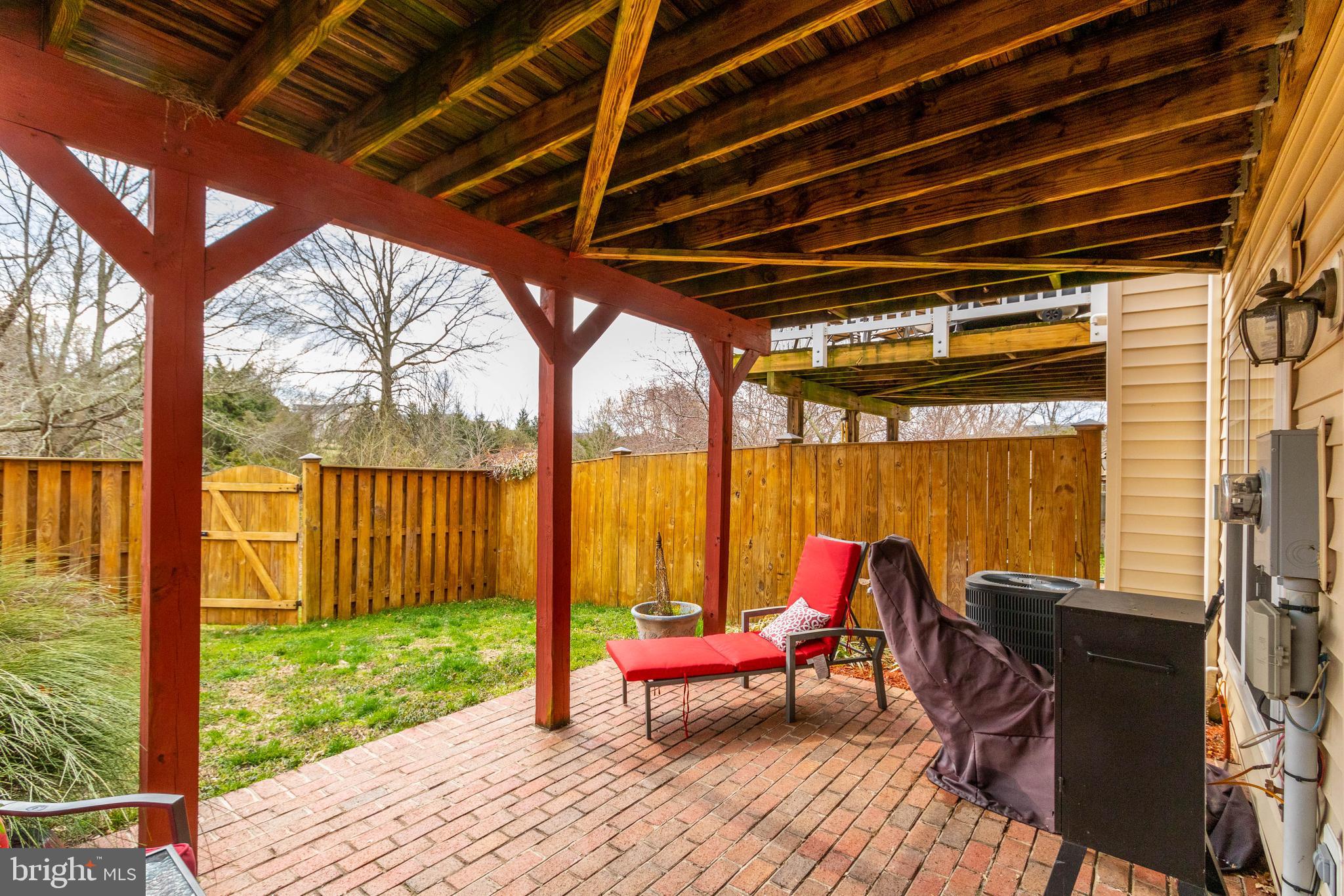 9185 Ribbon Falls Loop Bristow, VA 20136 - Photo 33 of 34 Custom Brick Patio