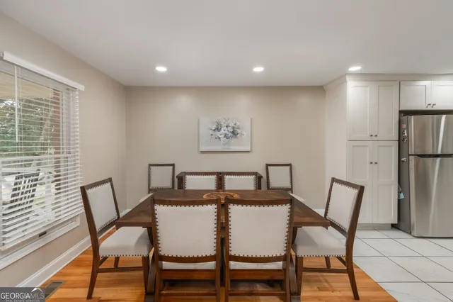 a view of a dining room with furniture