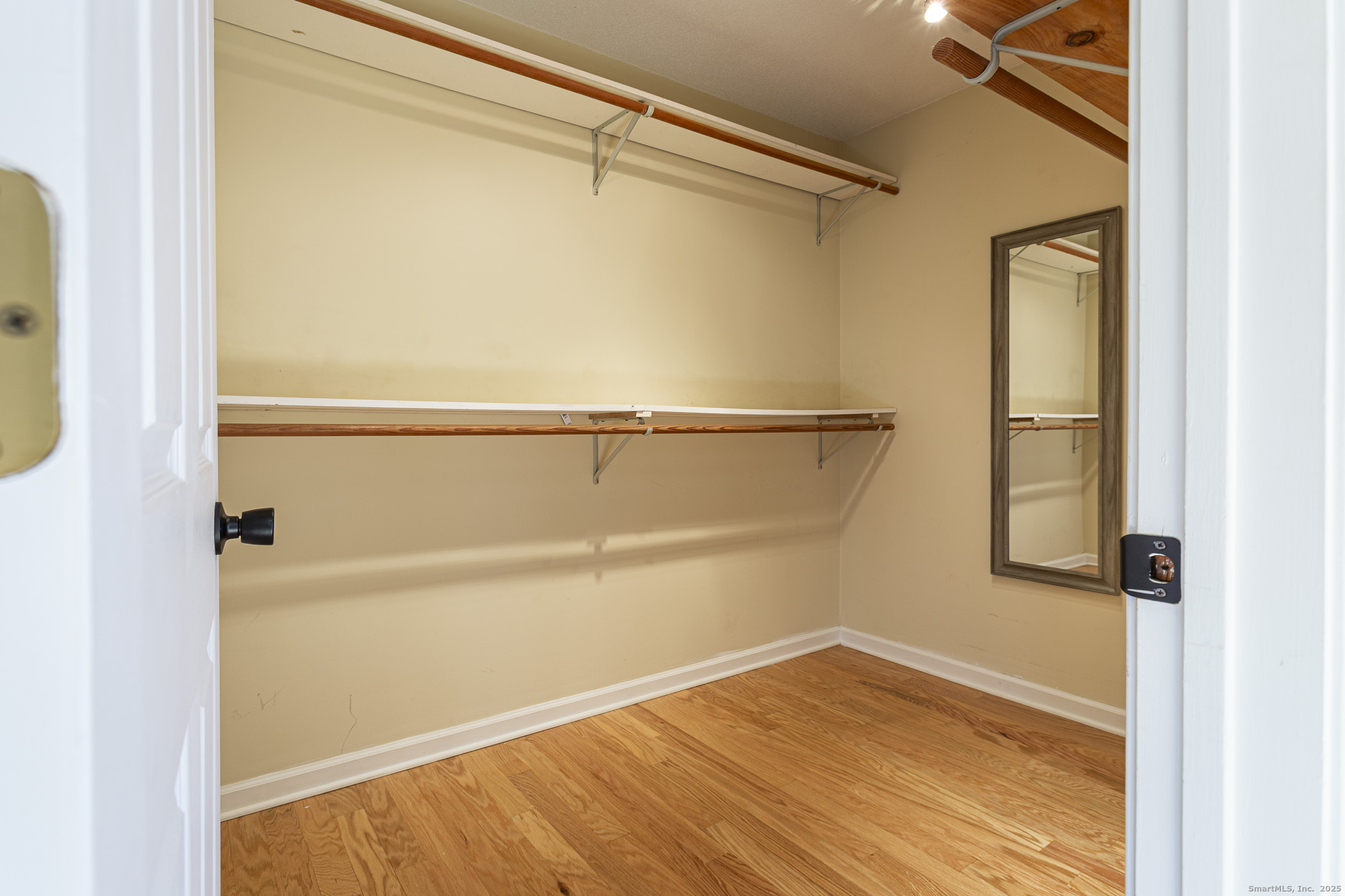 187 Lovers Lane, Unit 61 Torrington, CT 06790 - Photo 16 of 29 a view of walk in closet with empty racks