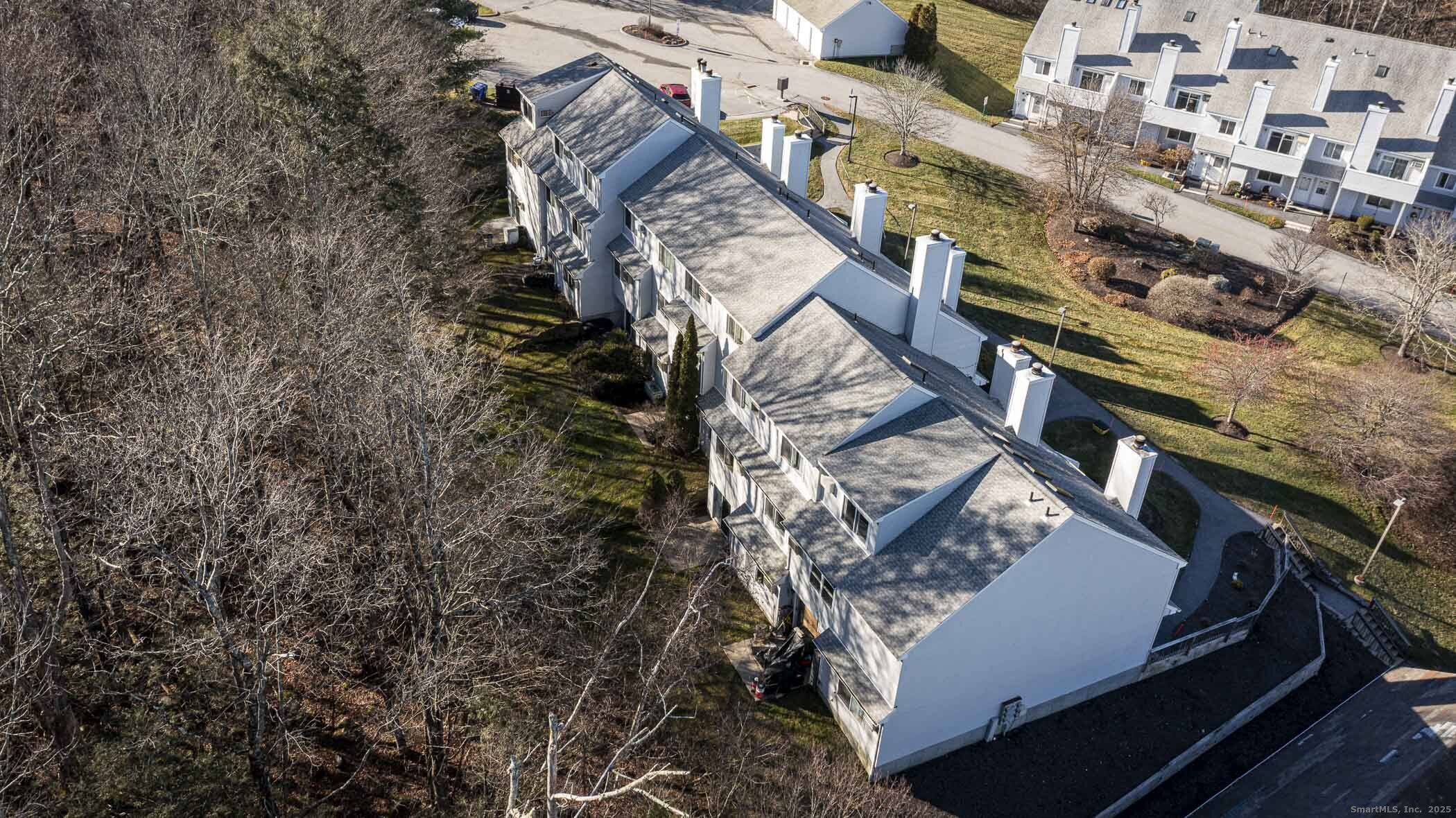 187 Lovers Lane, Unit 61 Torrington, CT 06790 - Photo 2 of 29 an aerial view of a house