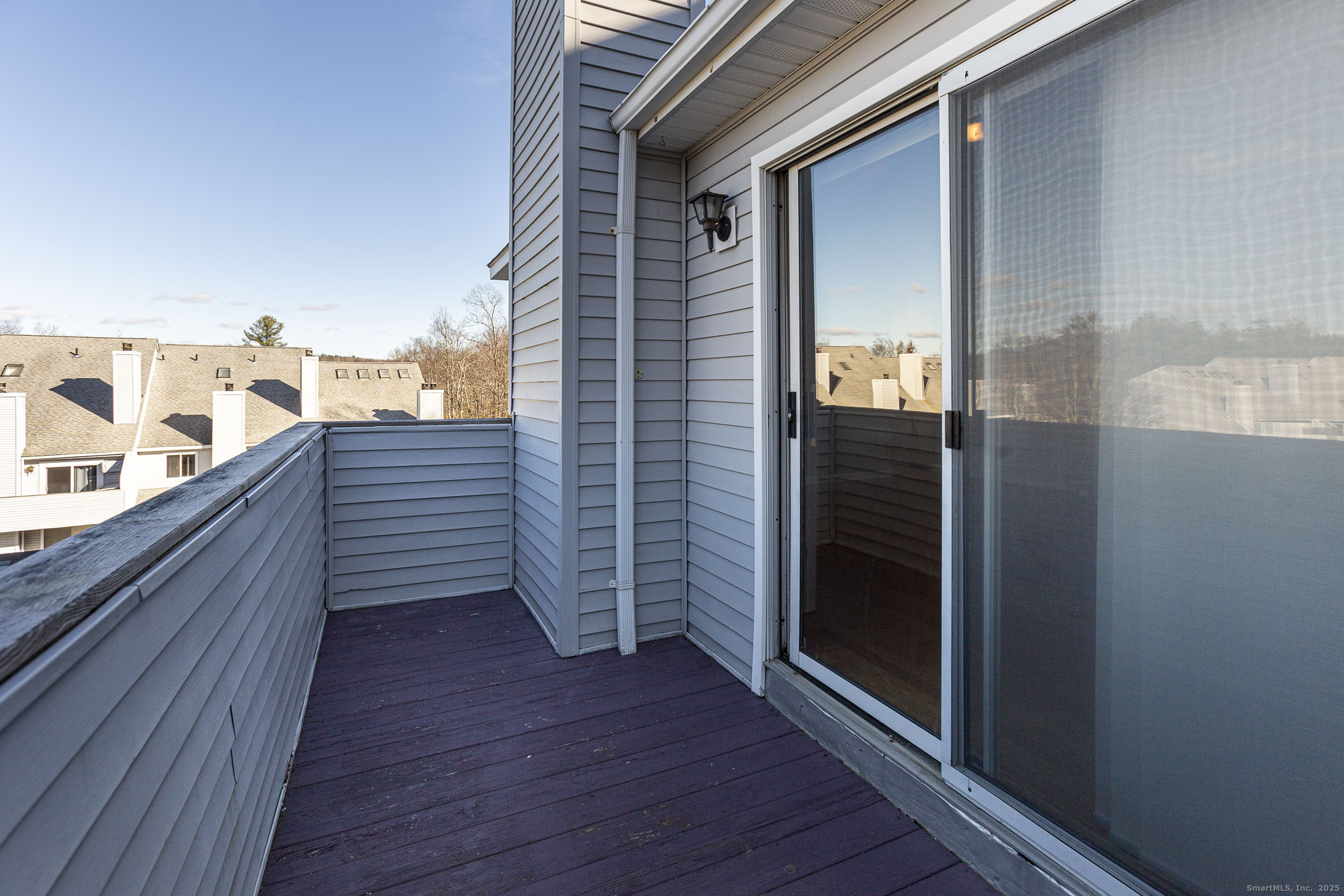 187 Lovers Lane, Unit 61 Torrington, CT 06790 - Photo 3 of 29 a view of a balcony from door