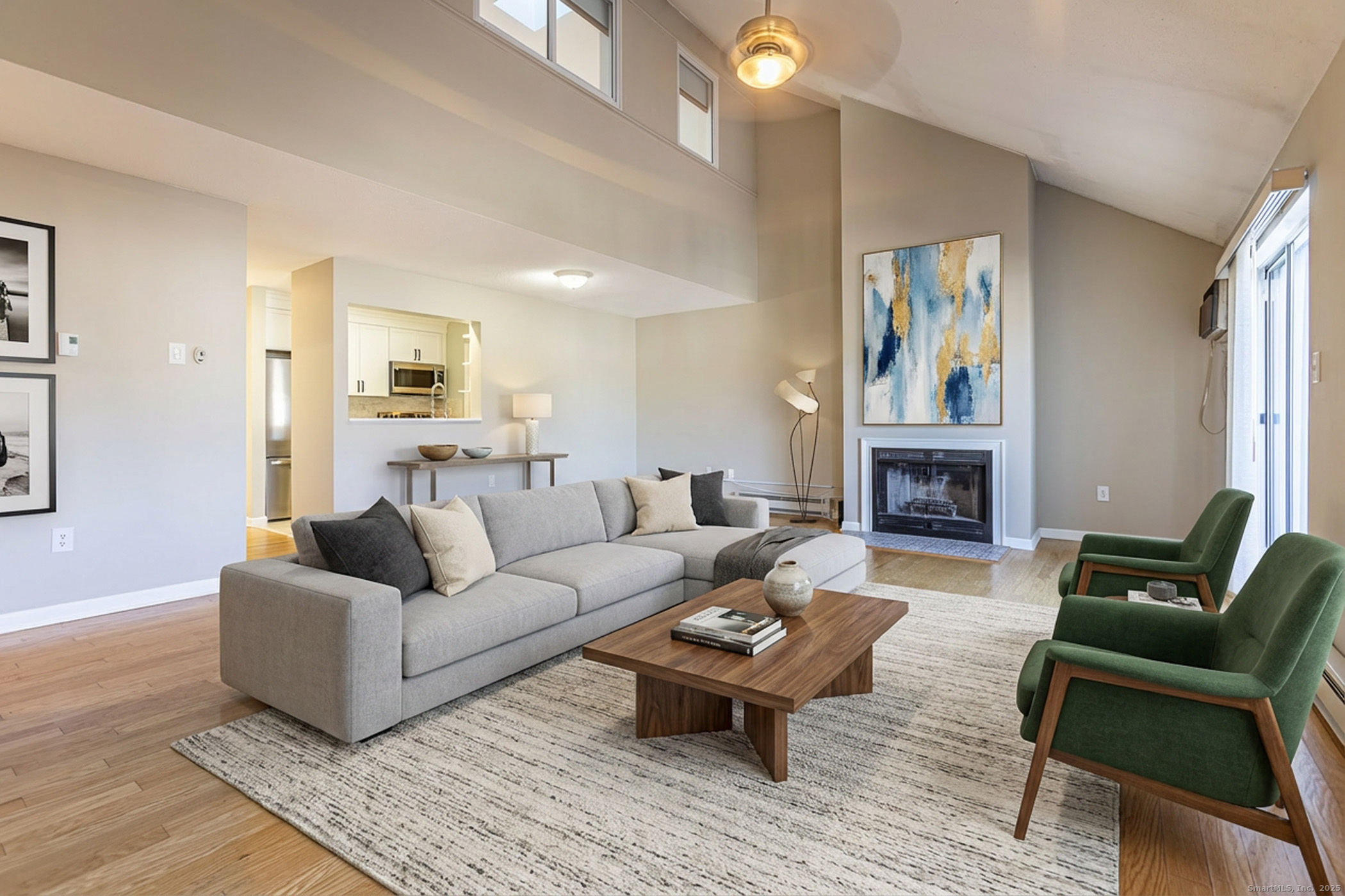 187 Lovers Lane, Unit 61 Torrington, CT 06790 - Photo 5 of 29 a living room with furniture and a fireplace