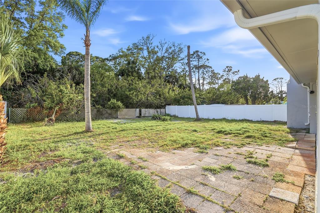 7840 Gulf Way Hudson, FL 34667 - Photo 31 of 37 a view of an outdoor space and a yard