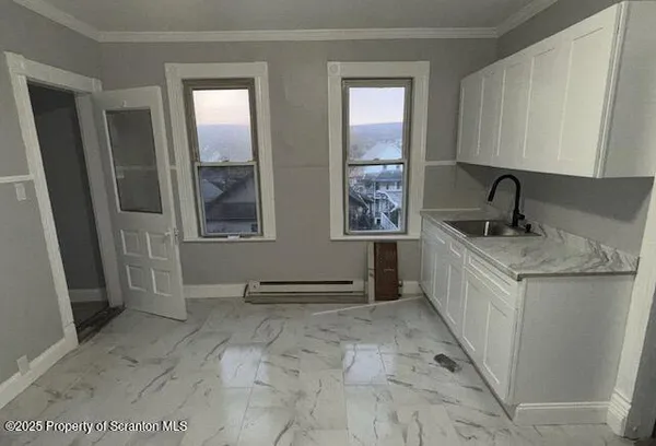 a view of a storage & utility room in a house