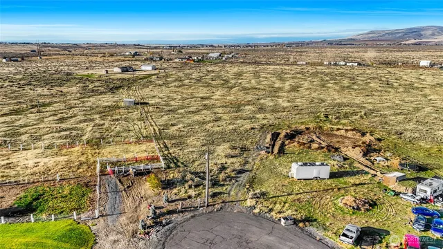an aerial view of residential building with ocean view
