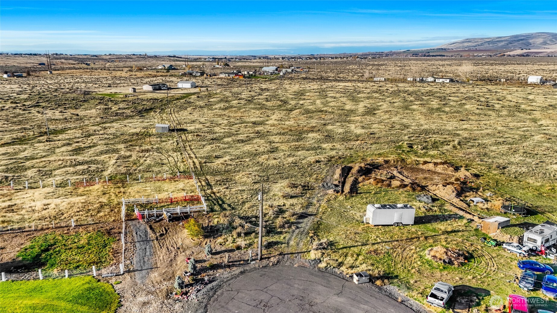 an aerial view of residential building with ocean view