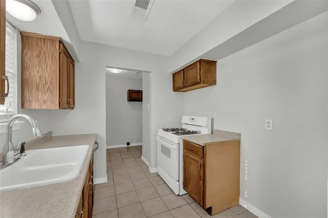 a view of a bathroom with a sink and a bathtub