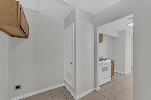 a view of room with washer and dryer
