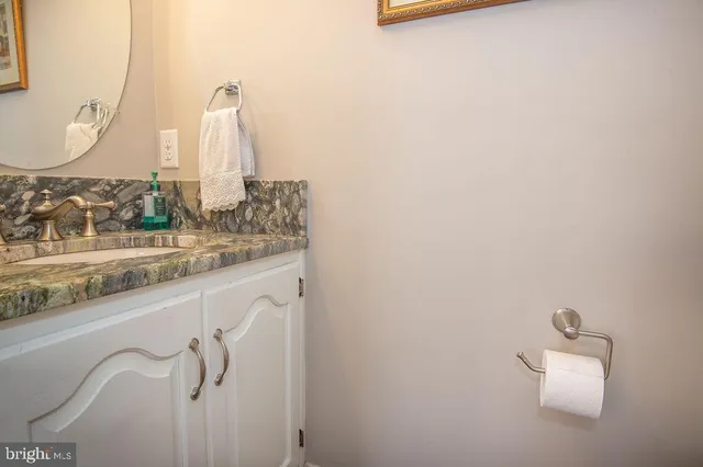 a white bath tub sitting in a bathroom